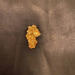 Man/Woman 14k gold nugget pendant. Nice pendant that goes with anything.